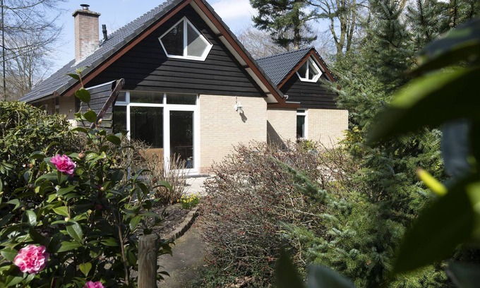 Bisselt House | Atmospheric house with a fireplace in a holiday park in the woods