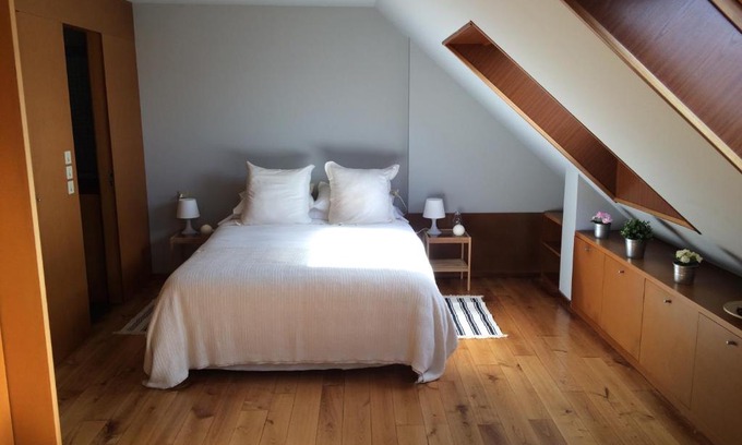 Souto Apartment | Attic loft to wake up by the sea.