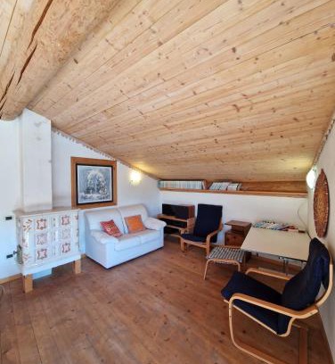 Baselga di Pine Apartment | Attico in Centro: Relax&Comfort