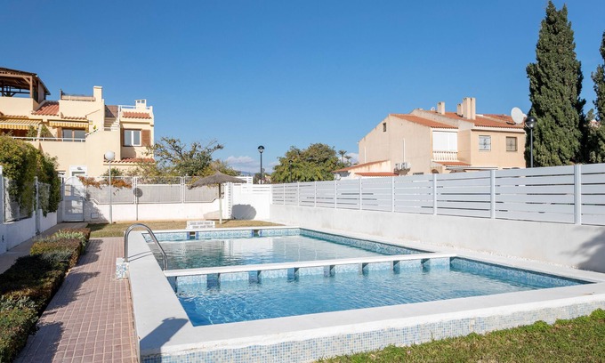 San Juan de Alicante House | BAHAMAS III (SANT JOAN) - Cozy apartment with shared swimming pool and free WiFi