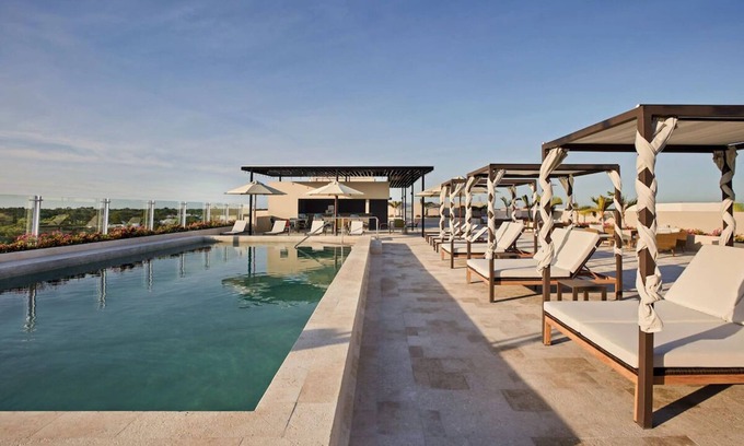 Playa del Carmen Hotel | Bask in Modern Style Comfort! 4 Spacious Units w/Kitchenette, Free Parking