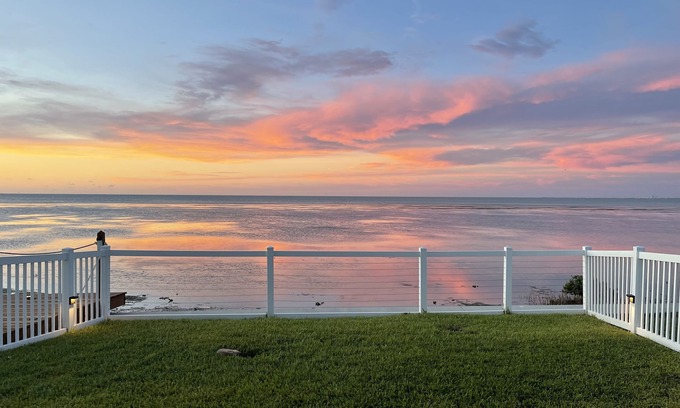 Port Isabel House | Bayfront Home ~close to beach~ Community pool~ hot tub ~ family friendly.