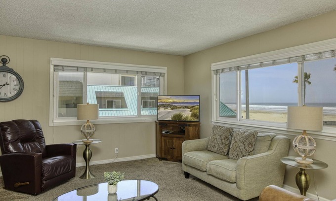 Downtown Condo | Beach just ten steps away.