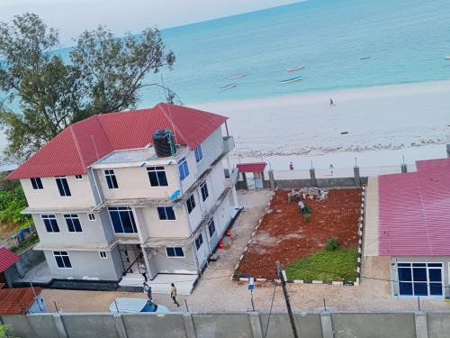 Uroa Apartment | Beachfront Bliss 2BR Suites with AC, Free WiFi Uroa Zanzibar