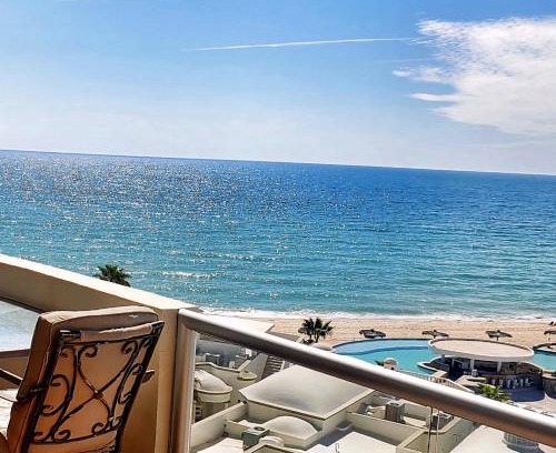 Sandy Beach Apartment | Beachfront Condo on Sandy Beach, Las Palmas Resort, 24hrs Security, Free Parking, Free Wi-Fi