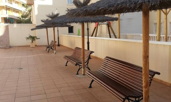 El Moncayo Apartment | Beachfront apartment with swimming pool, parking