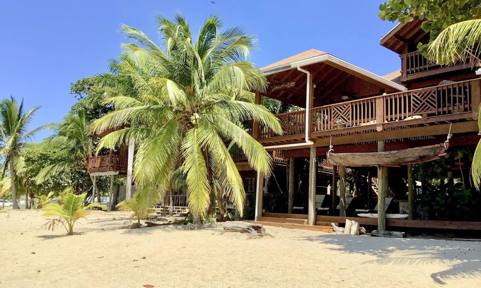 Antoneys Cay House | Beachfront home with pristine, calm waters, white sands and unbelievable sunset