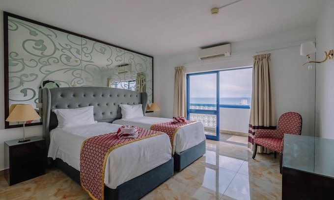Oura Hotel | Beachfront Hotel with Indoor & Outdoor Pool! 2 Homely Units with Full Kitchens!
