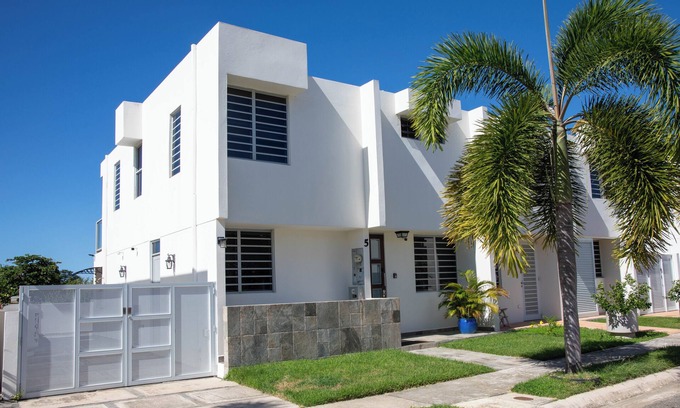 Ensenada House | Beachfront in gated community with patio, balcony, pool, close to all in Rincón