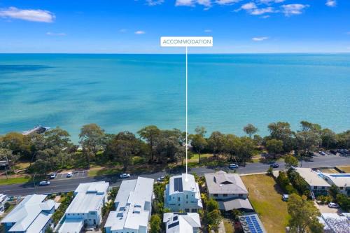 Urangan Apartment | Beachfront Luxury with Ocean Views and Alfresco Dining