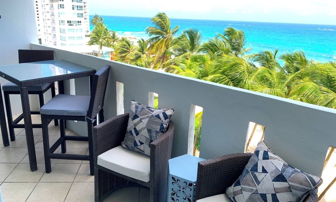 San Juan Apartment | Beachfront Oceanview 2-suite condo with balcony, AC, WiFi, Pool, Fitness Room