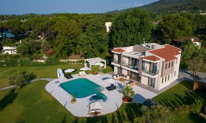 Vourvourou Villa | Beachfront villa in Vourvourou, Halkidiki with private pool, ideal for families.