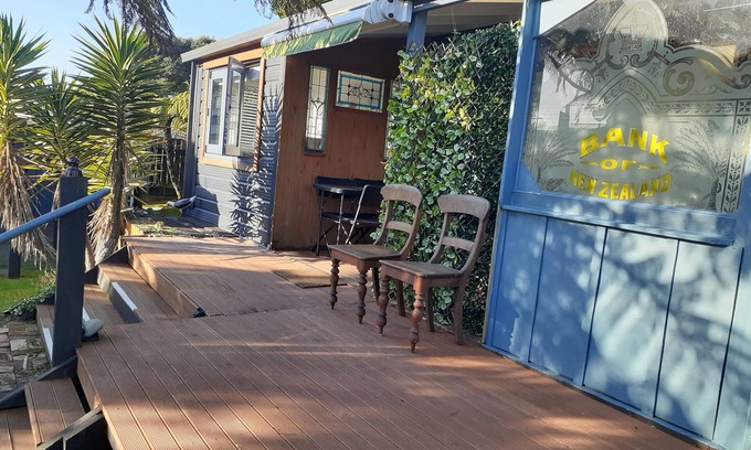 Westport Cottage | Beachside with bike trail access and fibre. Winter and weekly discounts now on.