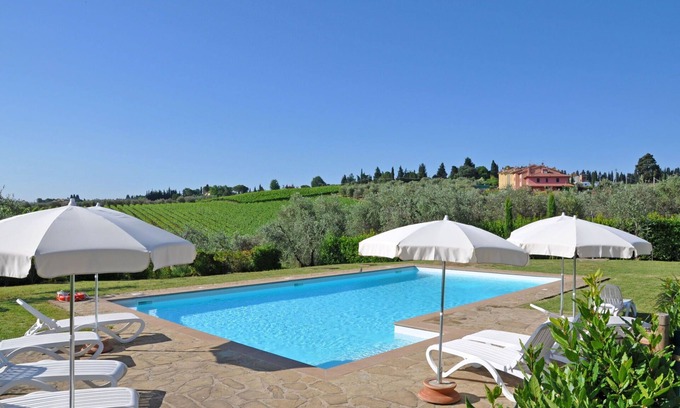 San Pietro in Bossolo Apartment | Beautiful apartment with pool, A/C, WIFI, panoramic view and parking, close to Greve In Chianti