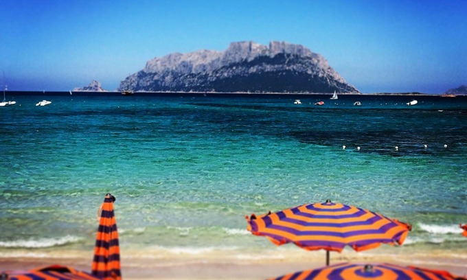 Porto Istana Apartment | Beautiful bay of white sand and clear sea opposite the island Tavolara