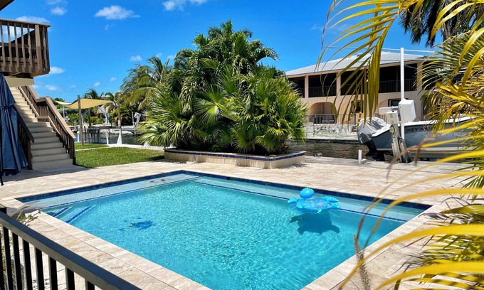 Whispering Pines House | Beautiful Canal Front Heated/Chilled Pool 4 Bdr Home