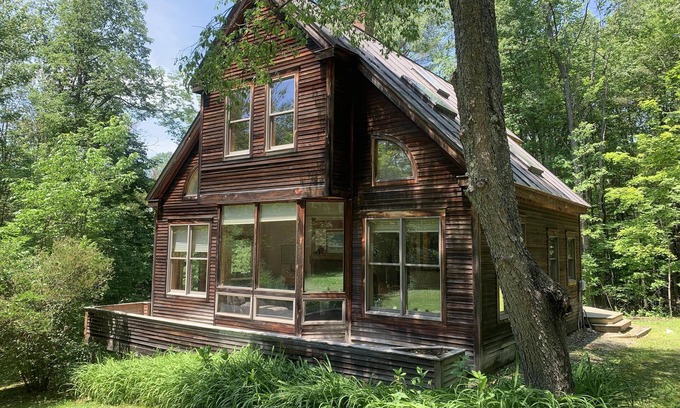Brownsville House | Beautiful craftsman-built home with natural wood and large windows in every room