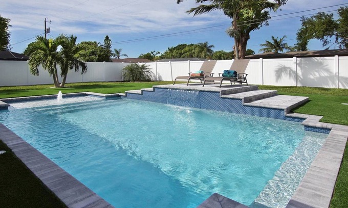 Caloosahatchee House | Beautiful fully renovated home with stunning heated pool, walk to downtown