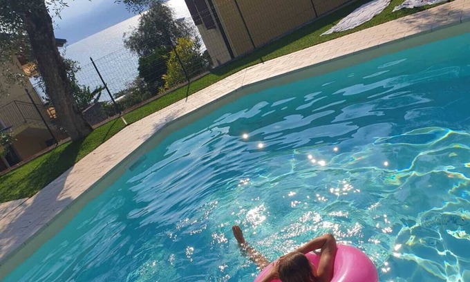Magugnago Apartment | Beautiful lake view apartment with swimming pool, 150 m from Lake Garda