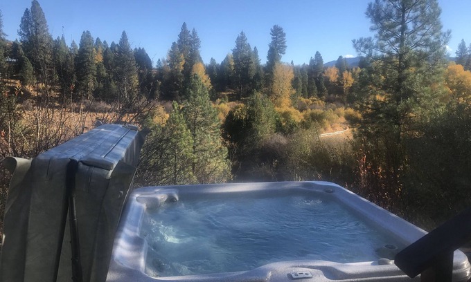 Garden Valley House | Beautiful mountain home with hot tub over looking Scriver Creek meadow.