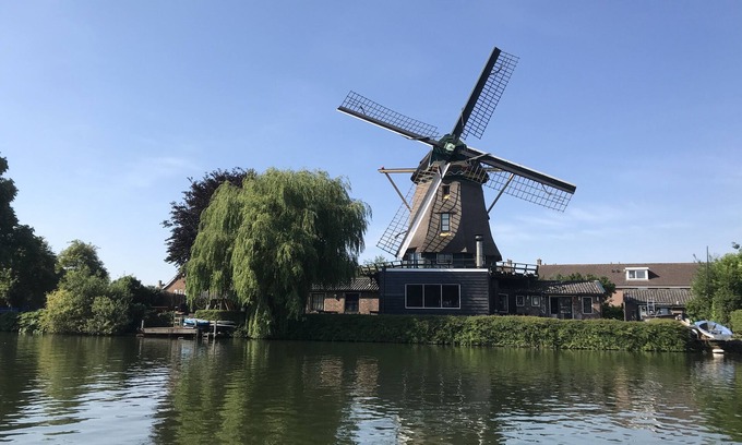 Municipality of Weesp House | Beautiful original windmill along the riverside