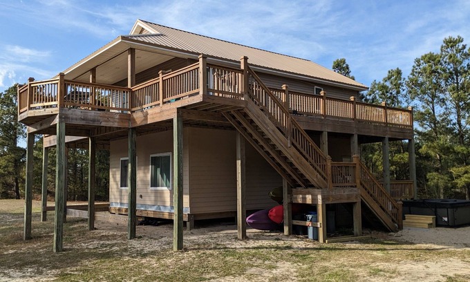 Carova Beach House | Beautiful Secluded Carova Beach House - Hot tub - Pet yard with access door