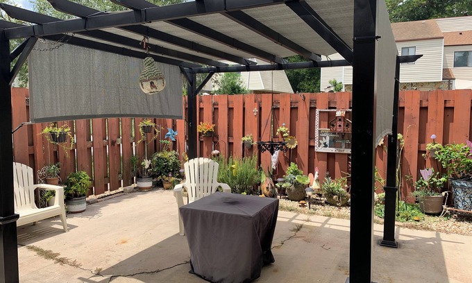 Ocala House | Beautiful unfurnished townhome that includes a patio with a pergola and fire pit