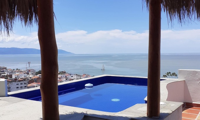 Downtown Puerto Vallarta Apartment | Beautiful view from penthouse suite. Pool, terrace, bar.