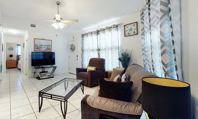 Port Isabel House | Beautiful waterfront home w/private dock, shared pool/hot tub - 1 dog OK