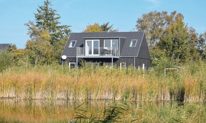 Østerskov House | Beautiful wooden house on the east coast of Langeland, in the Bukkemose area.