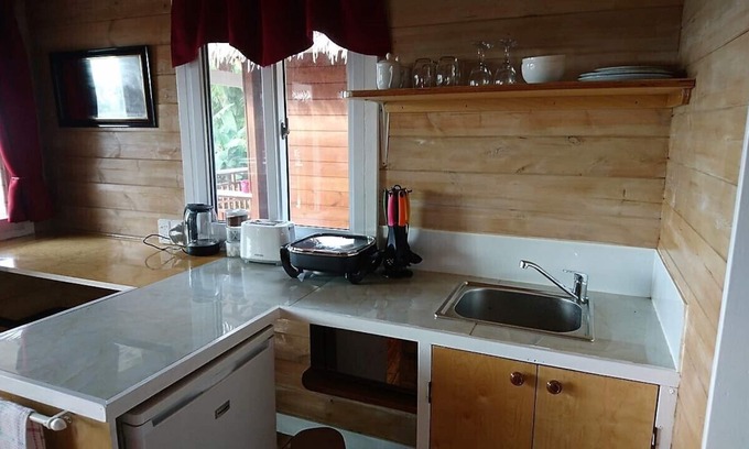 Rarotonga Cottage | Beautifully appointed inland property with ocean and mountain views.