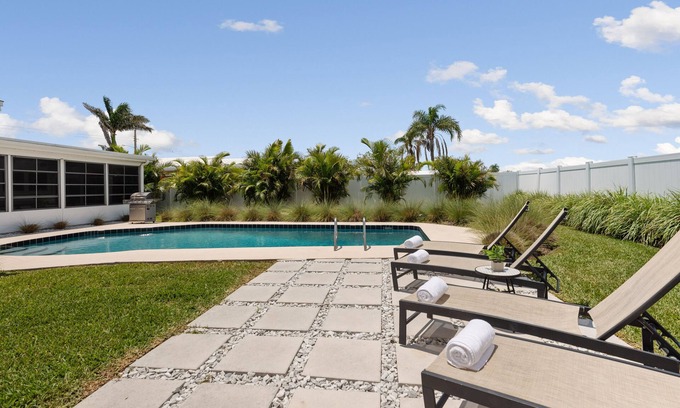 Venetian Way House | Beautifully renovated pool home - walking distance to the beach