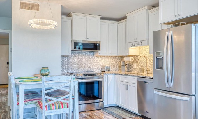 Garden City Apartment | Bella Vista: Marshfront Condo 1 Block To The Beach. Pool & Hot Tub-1st Floor
