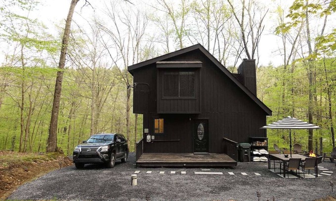 East Stroudsburg Cabin | BLVCK Cabin w/HotTub in the Mountains near Bushkill Falls