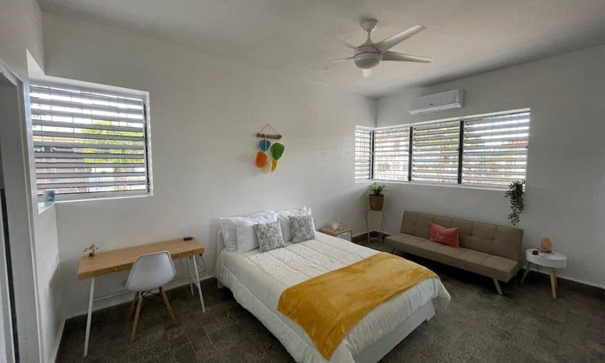 Hato Rey Central Apartment | Boho chic & cozy apartment near Hato Rey Banking area with solar panels.