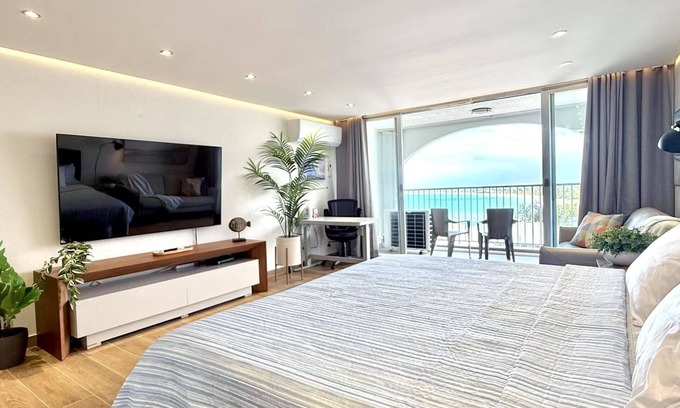 Isla Verde Apartment | Breathtaking high floor ESJ studio with stunning Ocean & direct beach access