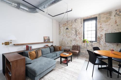 Westown Apartment | Brewery District 2-Story 2BR Apt Near Fiserv with Rooftop, Gym, and Parking