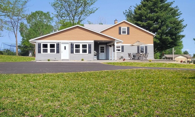 Dyersville House | Bring the whole family to this great home with an acre of room for fun.