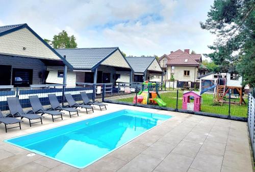 Ostrowo House | Bursztynowo Domki z basenem