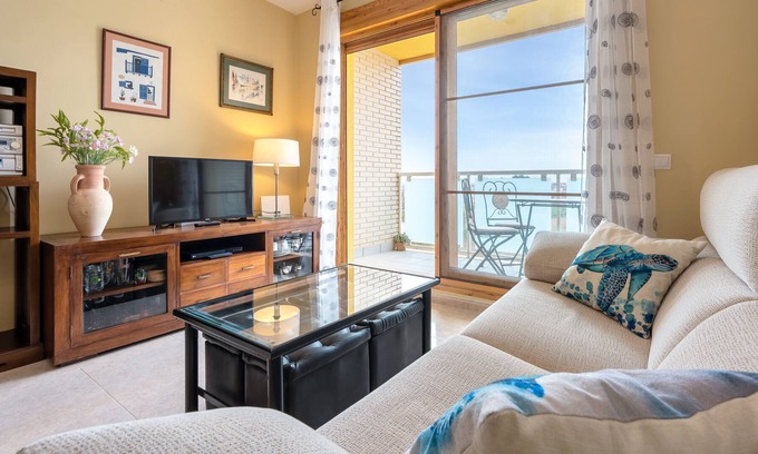 Sant Jaume d'Enveja Apartment | Ca la Marga apartment with pool, Wi-Fi, air conditioning and balcony