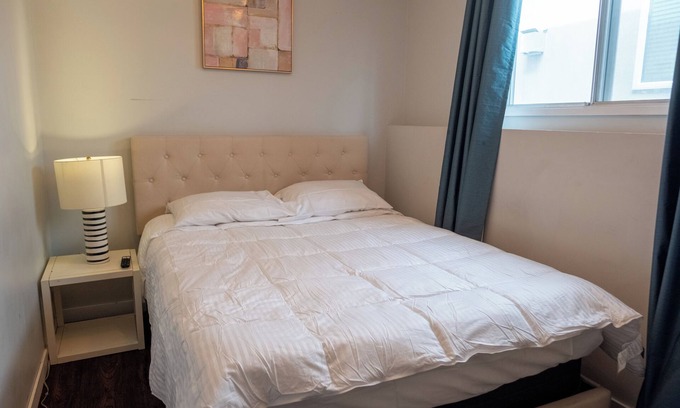Sunnyside House | Calgary's Cozy Room Waterside Bi-Level lower level
