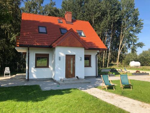 Pozezdrze House | Caloroczny domek letniskowy ze stawem