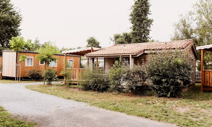 Saint-Laurent-de-Medoc Ski Chalet | Camping Le Paradis * - Chalet “Le Lys” 2 bedrooms DIM - SUN 4 people