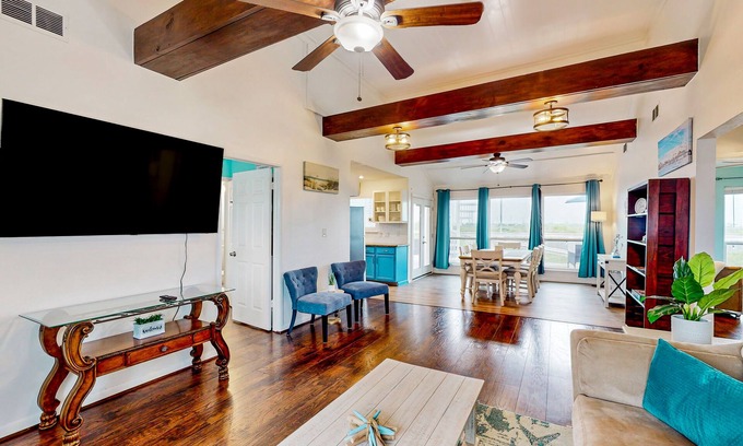 Spanish Grant House | Canal view retreat with vaulted ceilings & three-story observation deck