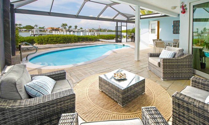 Isles of Capri House | CAPRI PARADISE! Beautiful waterfront home. Private heated pool and dock