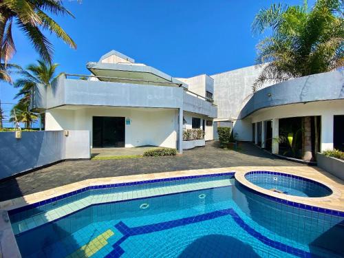 Parque Oasis House | Casa Alto Padrão de Frente ao Mar