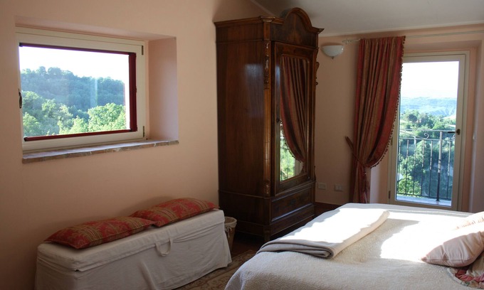 Bagnoregio Apartment | CASA AMOROSA is A HOUSE ON THREE FLOORS WITH A HABITABLE CELLAR AND TWO TERRACES.