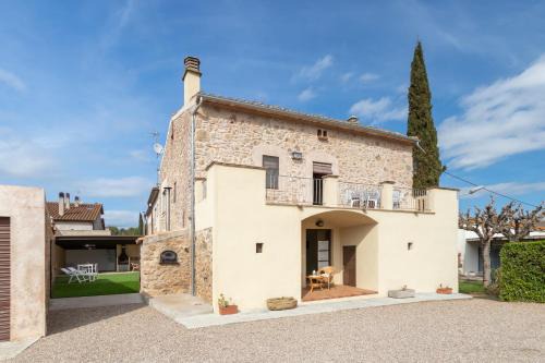 Sant Jordi Desvalls House | Casa de piedra en la Costa Brava