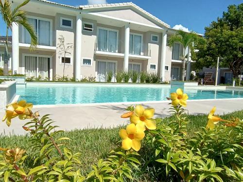 Puerto Seguro Center House | Casa em Arraial D'ajuda -3 suítes, lazer completo- Piscina, Sauna e Beach tênis