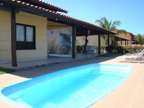 Zumbi House | Casa espetacular em condomínio pé-na-areia, PZ11